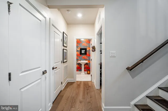 a view of entryway with wooden floor