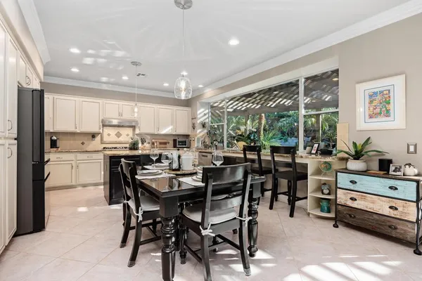 a view of a dining room kitchen and livingroom