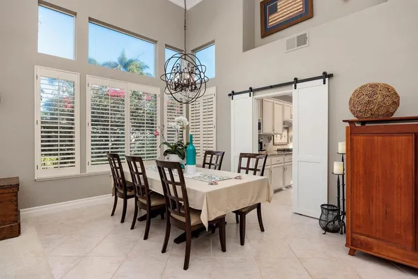 a view of a dining room with furniture