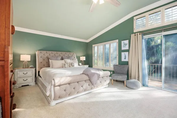 a spacious bathroom with a large tub sink shower and double vanity