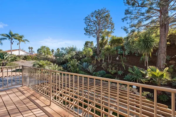 a view of a hallway view with staircase