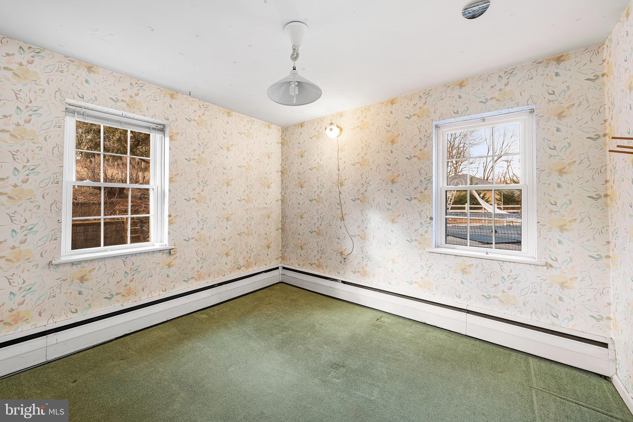 906 Hunt Road Newtown Square, PA 19073 - Photo 15 of 40 an empty room with a window