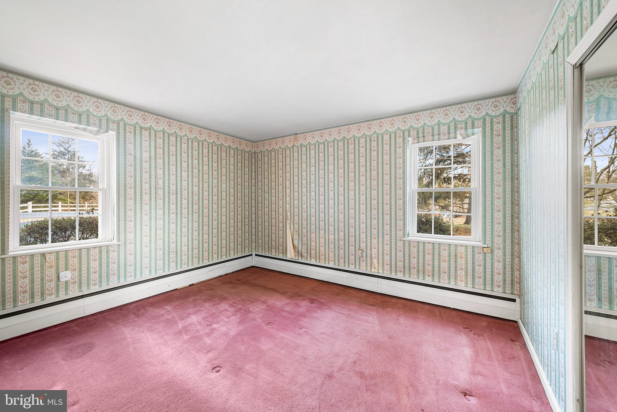 906 Hunt Road Newtown Square, PA 19073 - Photo 16 of 40 an empty room with windows