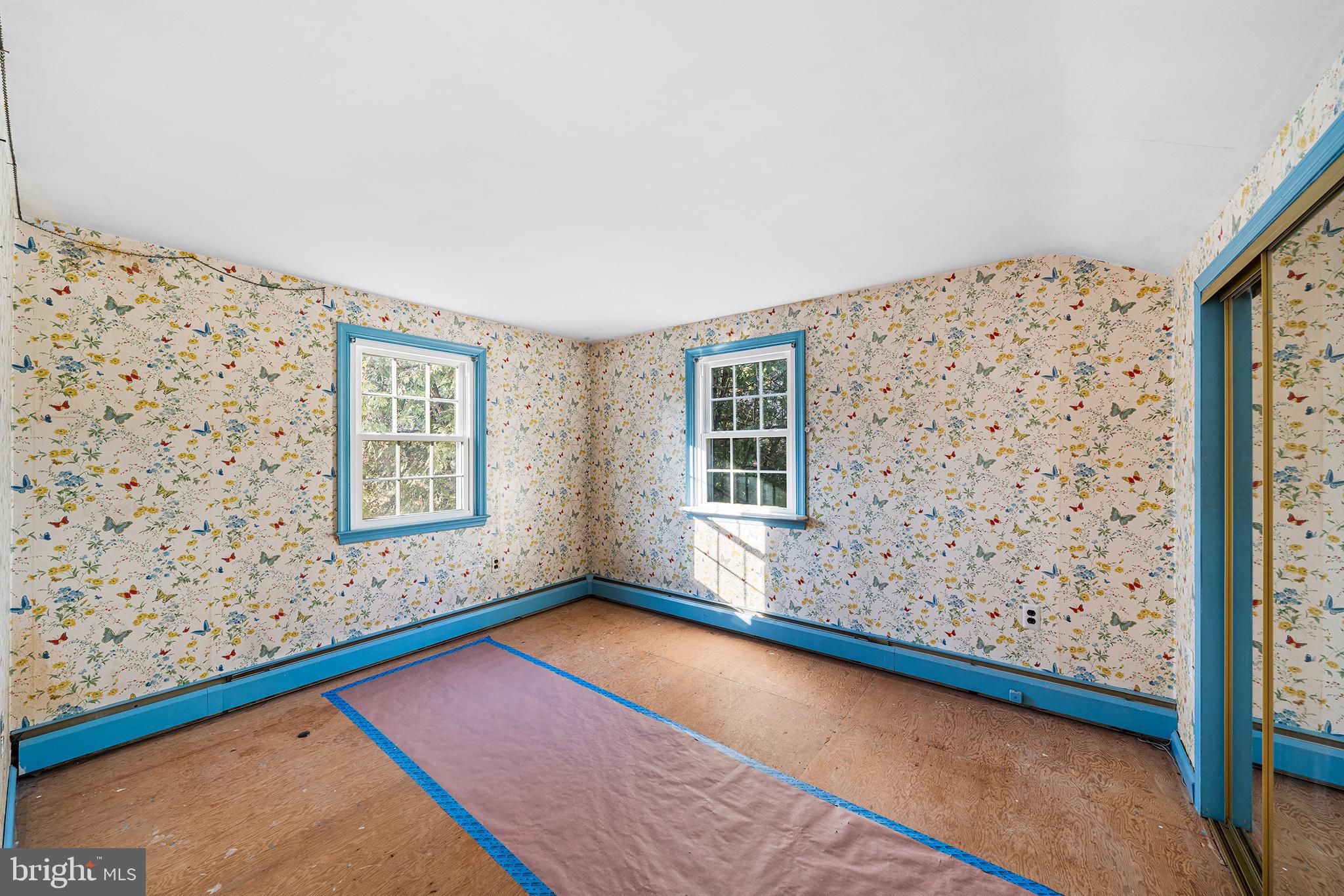 906 Hunt Road Newtown Square, PA 19073 - Photo 28 of 40 wooden floor in a room with windows