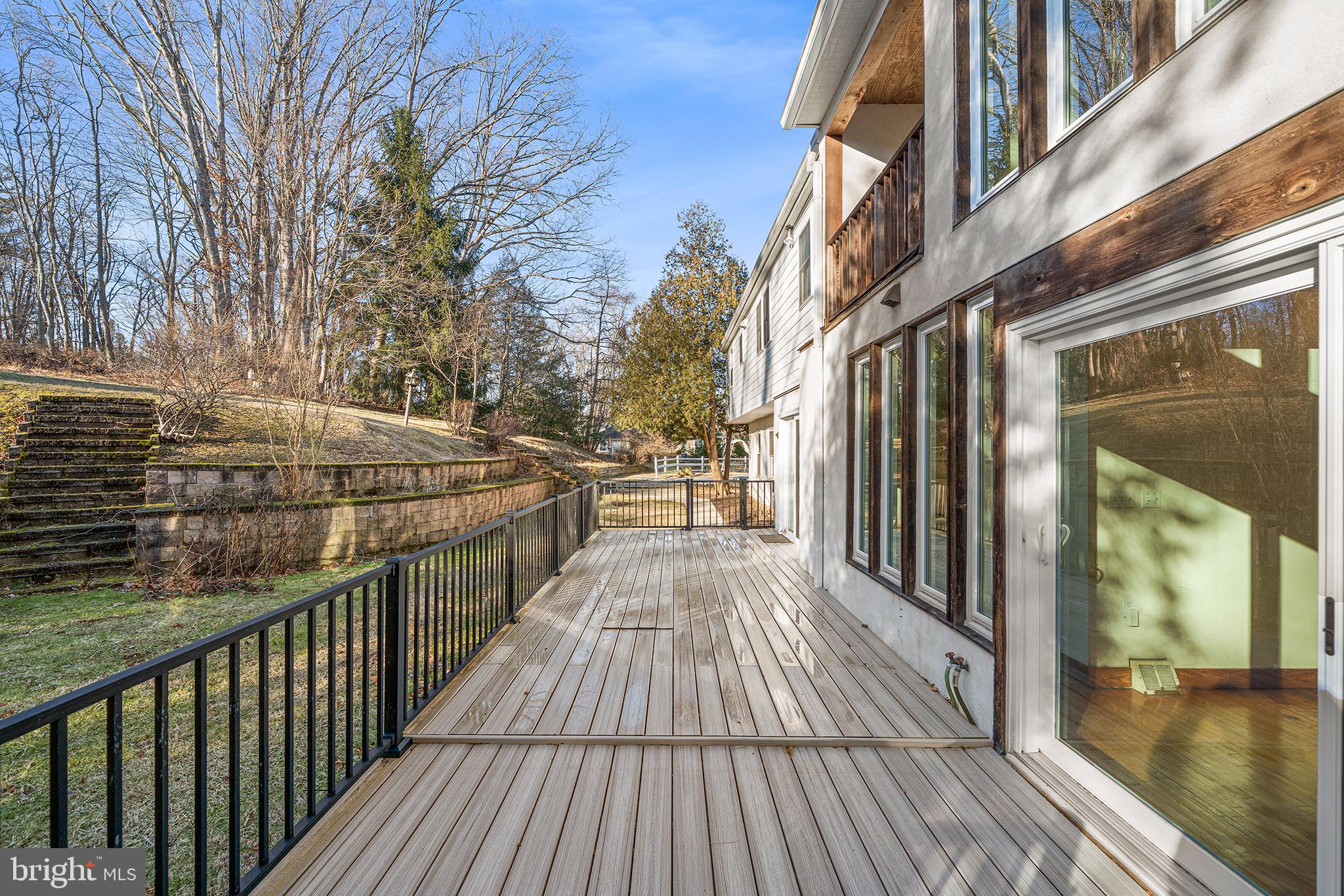 906 Hunt Road Newtown Square, PA 19073 - Photo 31 of 40 a view of a balcony with wooden floor and floor