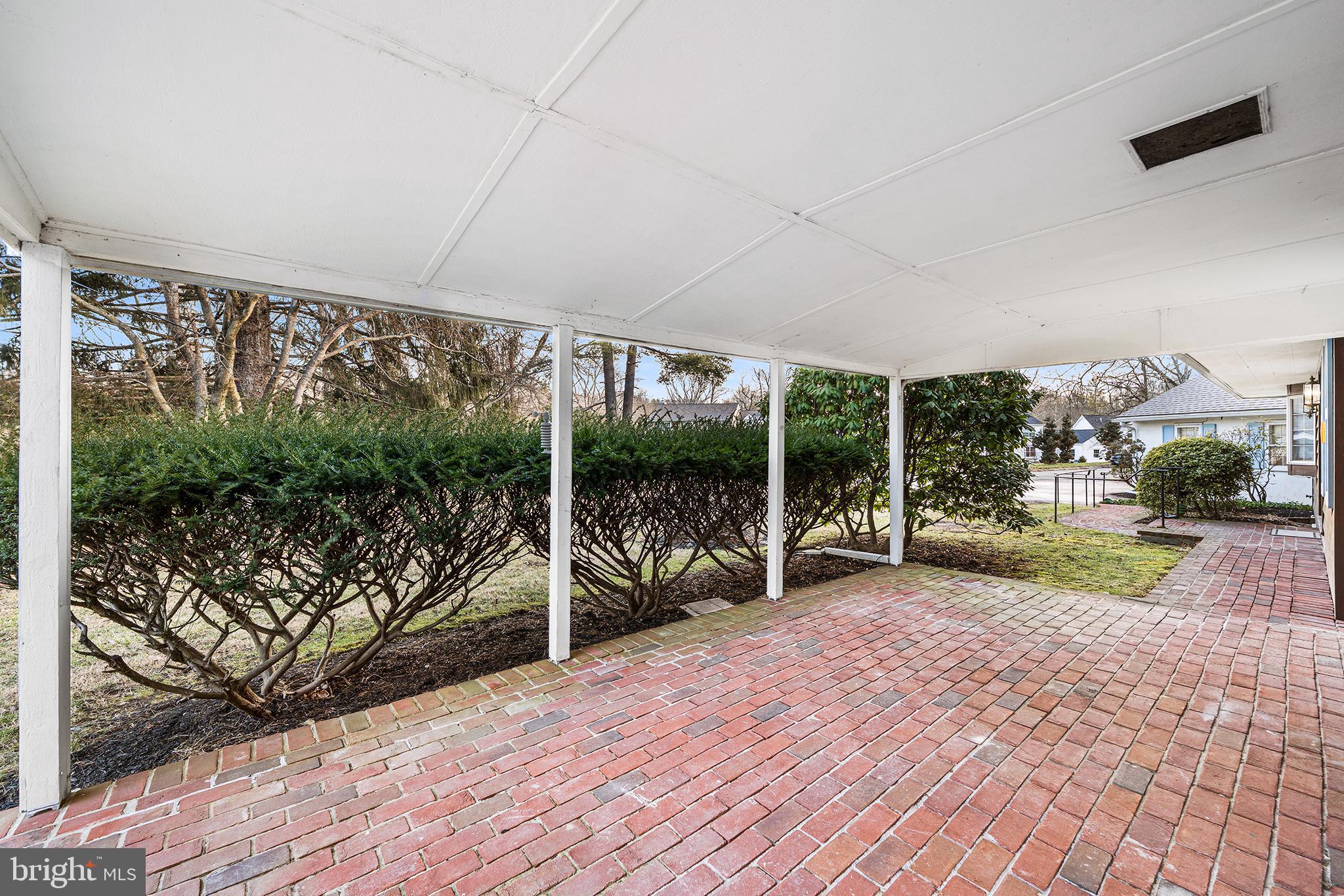906 Hunt Road Newtown Square, PA 19073 - Photo 36 of 40 a garden view with a seating space