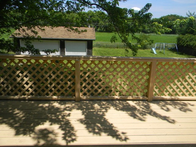169 Swanson Road Sycamore, IL 60178 - Photo 6 of 11 a view of a wooden fence