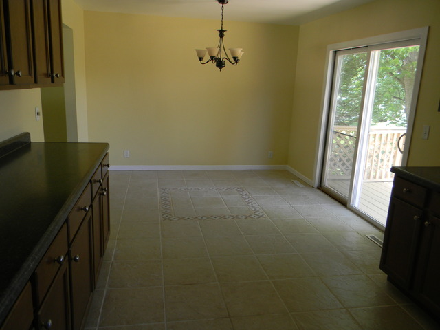 169 Swanson Road Sycamore, IL 60178 - Photo 7 of 11 a view of storage and utility room with a window