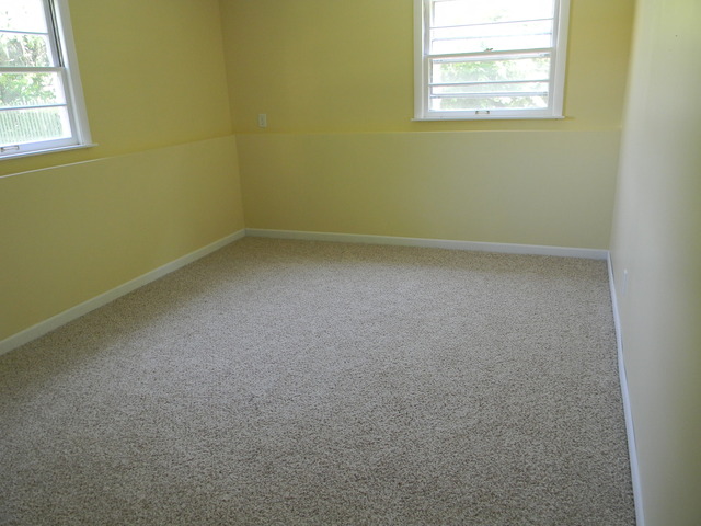 169 Swanson Road Sycamore, IL 60178 - Photo 9 of 11 an empty room with a window