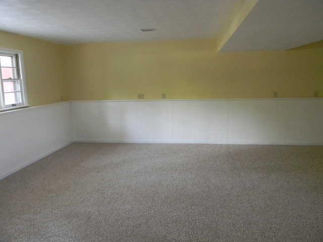 169 Swanson Road Sycamore, IL 60178 - Photo 10 of 11 an empty room with a window