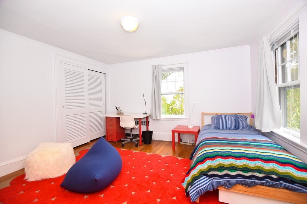 47 Ellison Road Newton, MA 02459 - Photo 12 of 18 a bedroom with a bed and a window