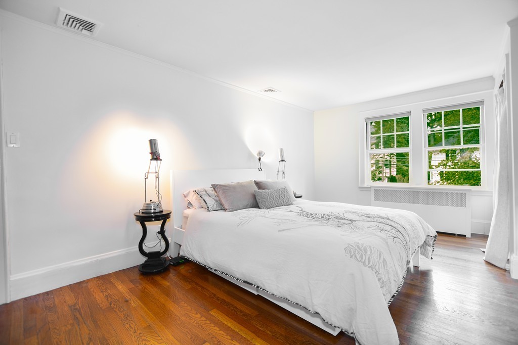 47 Ellison Road Newton, MA 02459 - Photo 9 of 18 a bedroom with a bed and a window