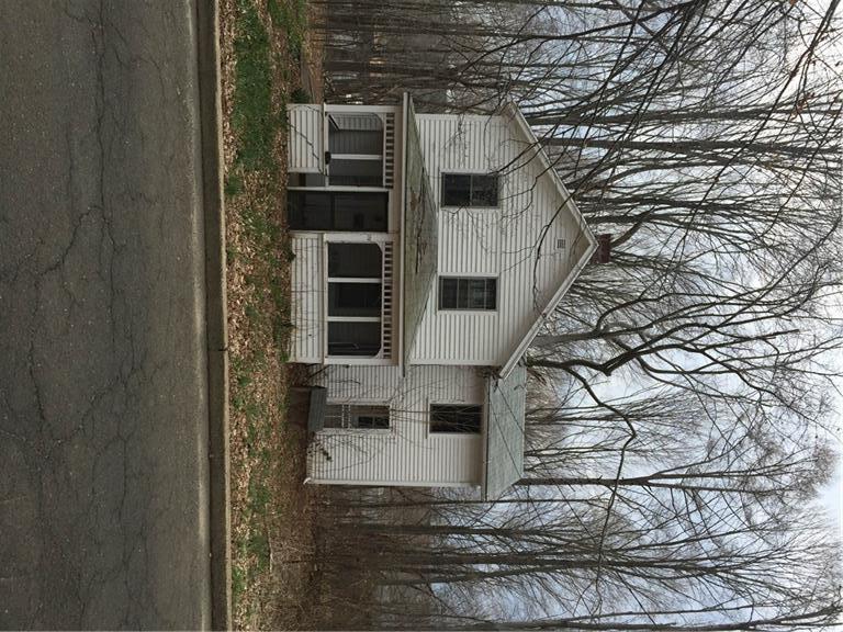 179 Butternut Street Middletown, CT 06457 - Photo 1 of 1 a view of residential house with wooden stairs