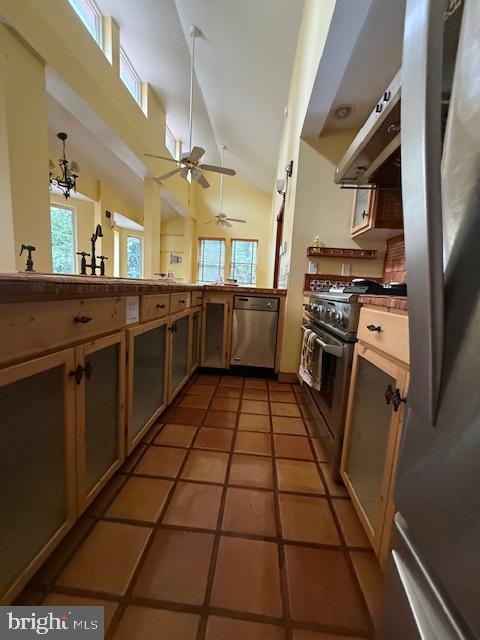 12330 12330-apt B Potomac View Road Newburg, MD 20664 - Photo 14 of 38 a kitchen with stainless steel appliances a stove a sink and a refrigerator