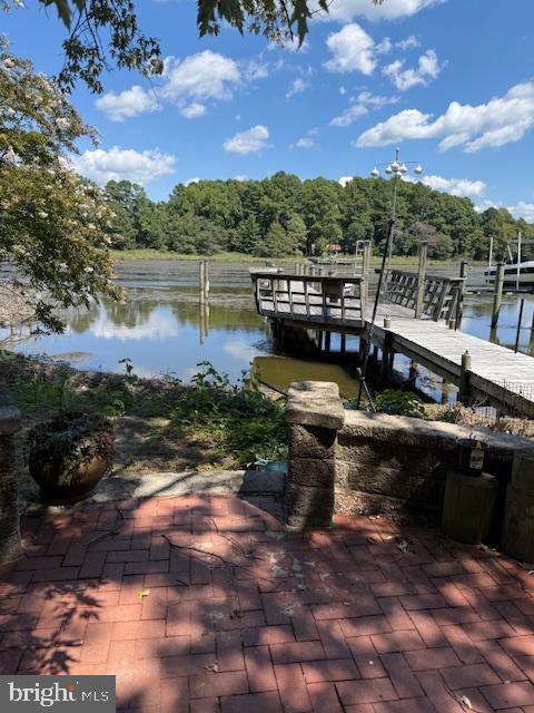 12330 12330-apt B Potomac View Road Newburg, MD 20664 - Photo 34 of 38 a view of a lake with a table and a bench
