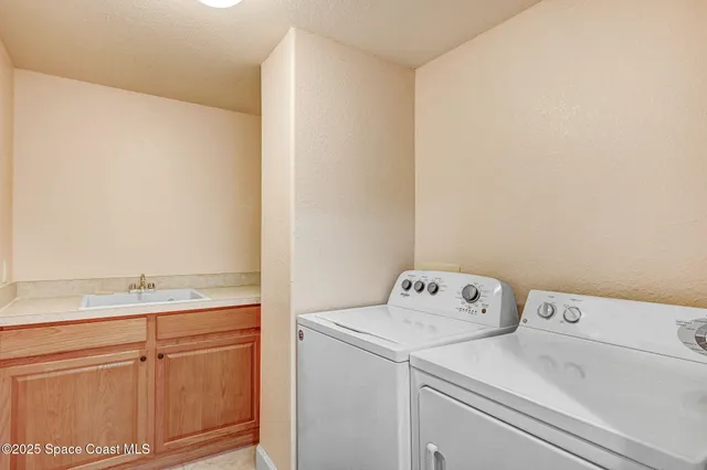 a living room with furniture potted plant and a window