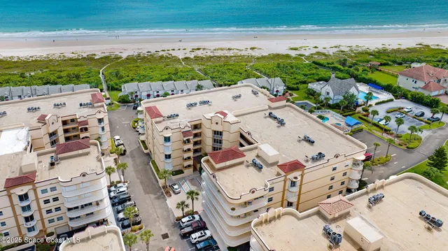 a view of a city with an ocean