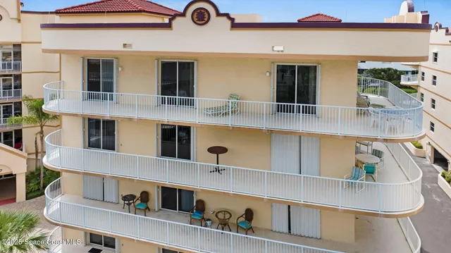 a kitchen with stainless steel appliances kitchen island granite countertop a sink and cabinets