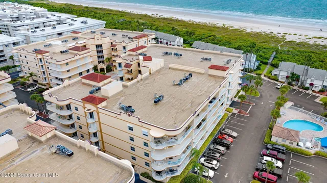 a view of a bathroom from a corridor