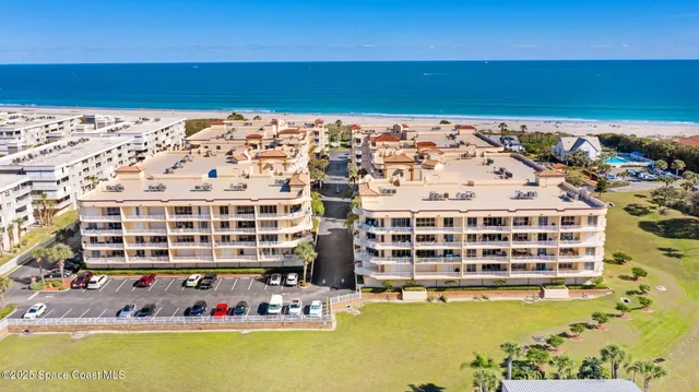 a living room with furniture a rug and a window