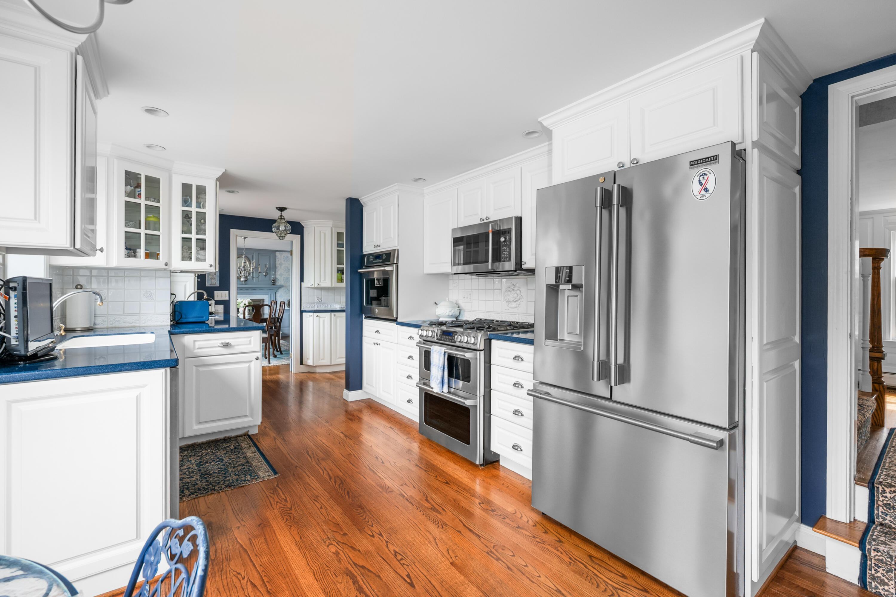 44 Buena Vista Road Chatham, MA 02633 - Photo 22 of 73 a kitchen with cabinets stainless steel appliances and wooden floor