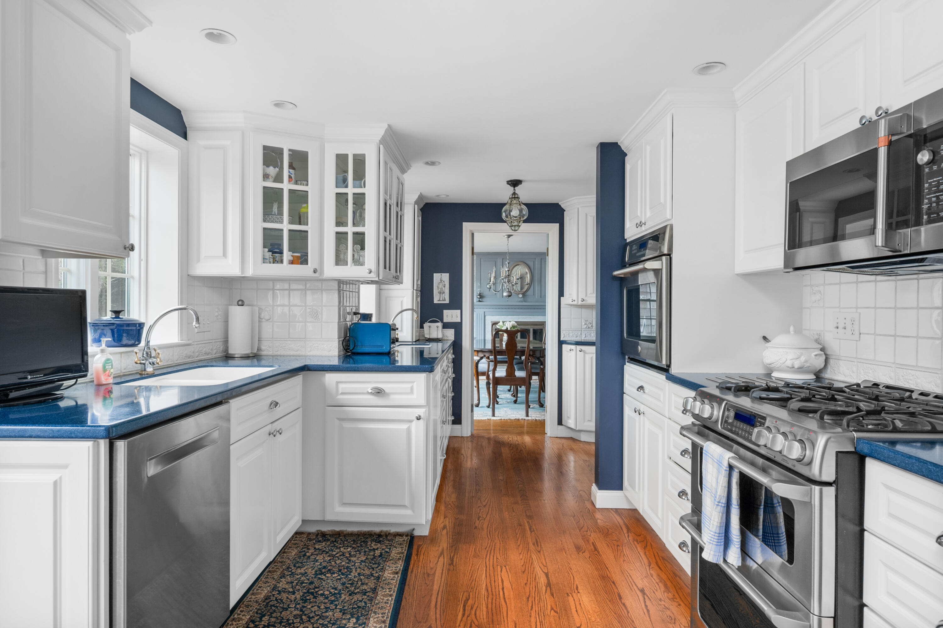 44 Buena Vista Road Chatham, MA 02633 - Photo 23 of 73 a kitchen with stainless steel appliances a stove sink microwave and refrigerator