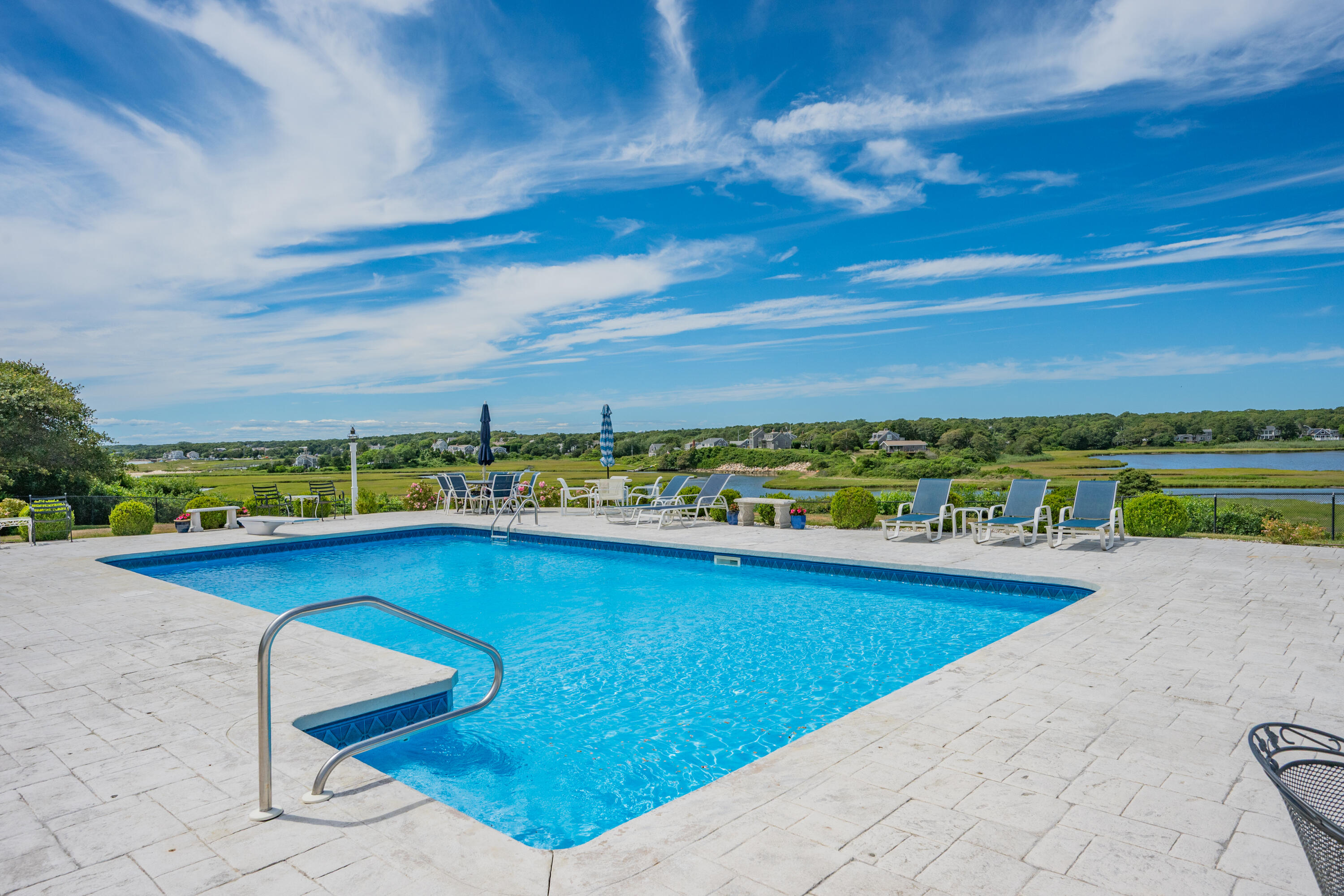 44 Buena Vista Road Chatham, MA 02633 - Photo 5 of 73 a view of a swimming pool and an outdoor seating