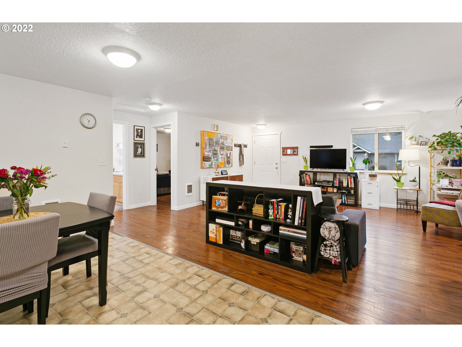 601 West 1st Street, Unit 18 Newberg, OR 97132 - Photo 12 of 21 a living room with furniture and wooden floor