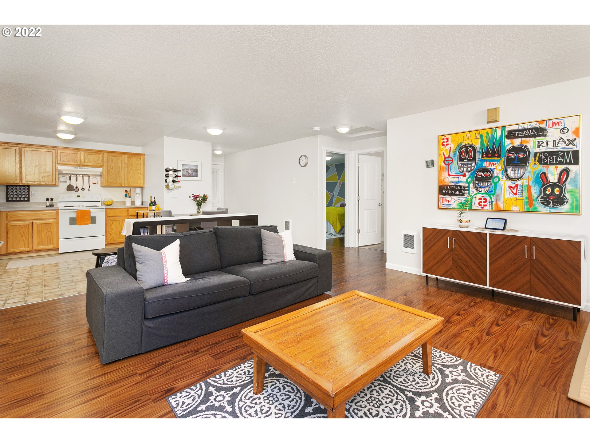 601 West 1st Street, Unit 18 Newberg, OR 97132 - Photo 7 of 21 a living room with furniture and a table