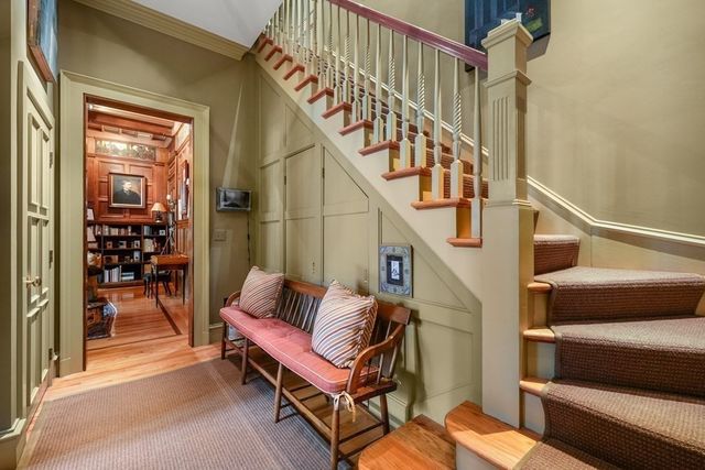 a living room with furniture and a rug