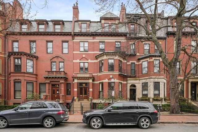 a car parked in front of a building