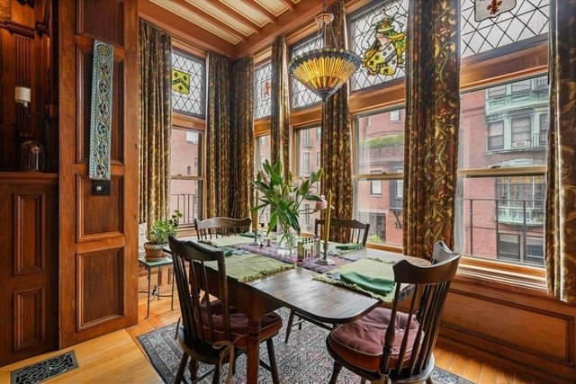 a view of a dining room with furniture window and outside view