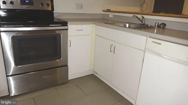 a view of a kitchen with washing machine