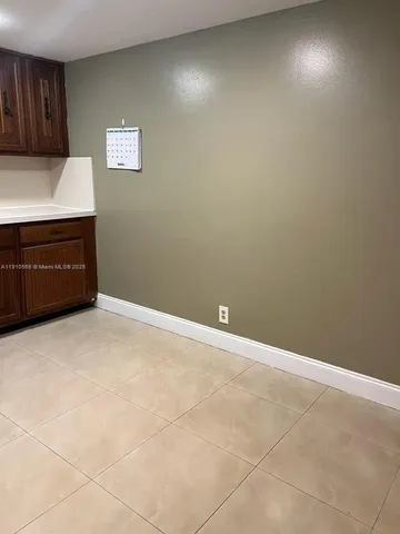 a view of hallway with a large window