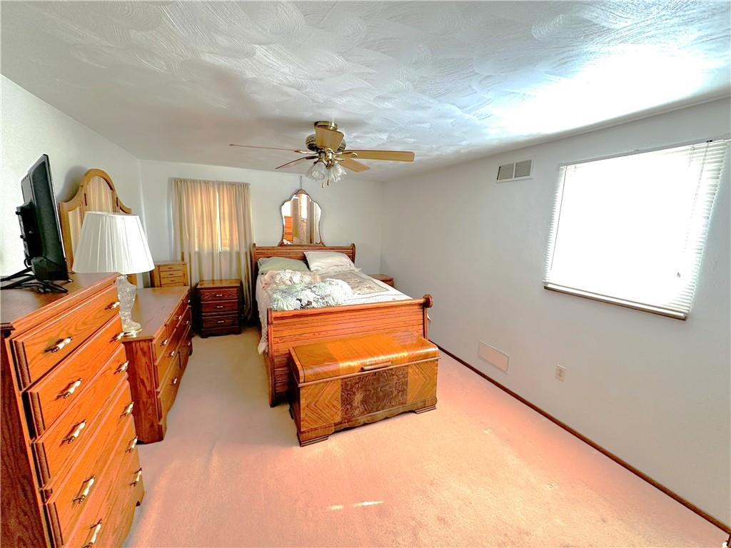 151 Stone Quarry Road Aliquippa, PA 15001 - Photo 13 of 26 a view of living room with furniture and a window