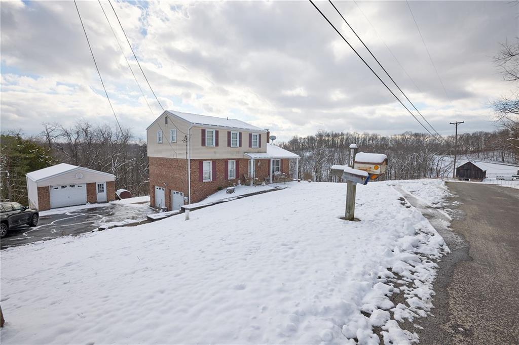 151 Stone Quarry Road Aliquippa, PA 15001 - Photo 2 of 31 Front of home showing the detached garage in rear