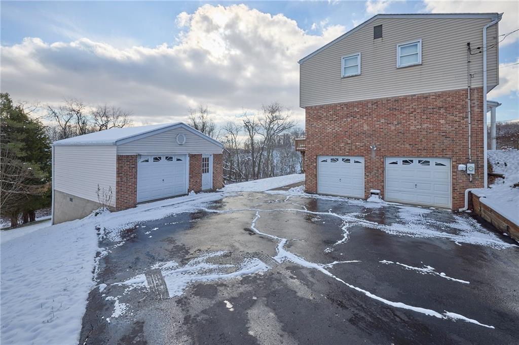 151 Stone Quarry Road Aliquippa, PA 15001 - Photo 23 of 26 a view of a house with a backyard