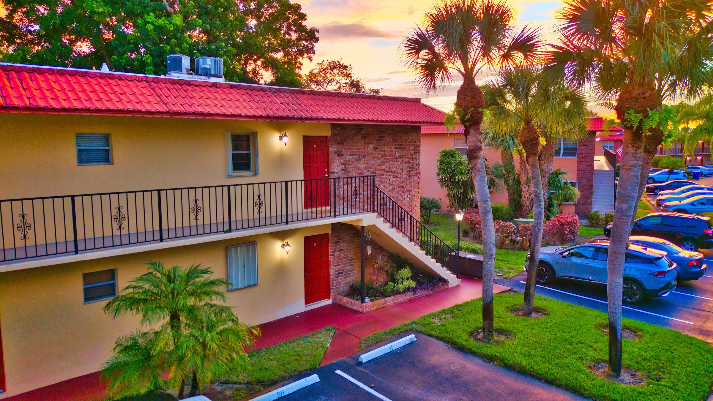 a view of swimming pool with a bench in a patio
