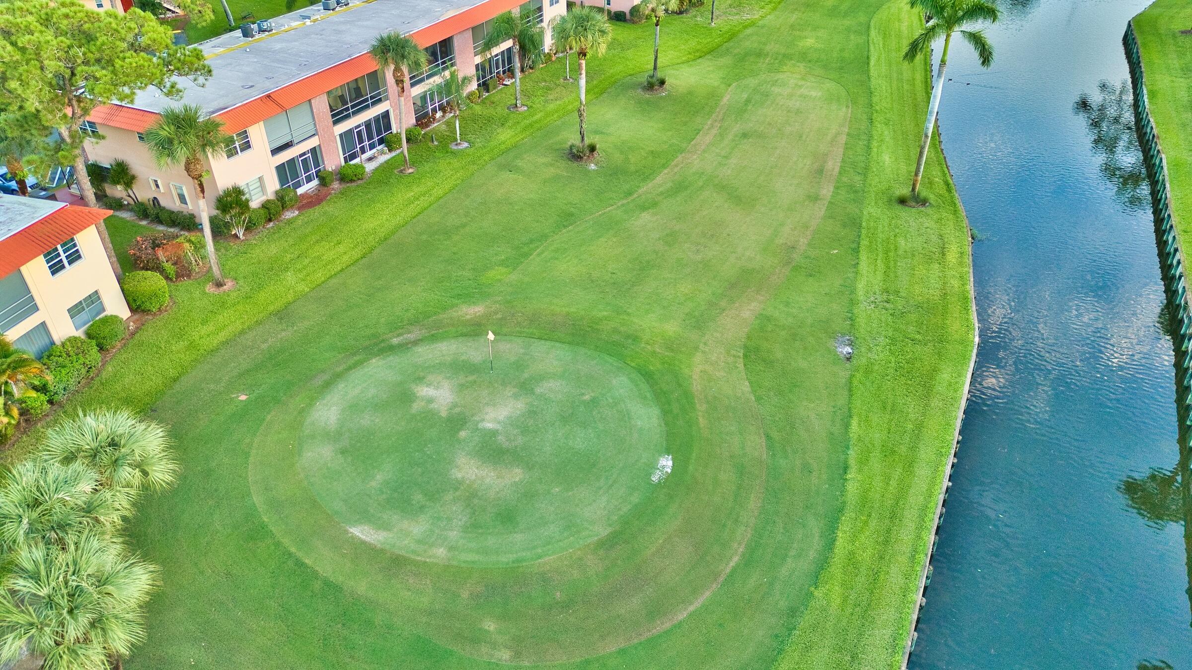1911 Southwest Palm City Road, Unit J Stuart, FL 34994 - Photo 23 of 42 a view of an aerial view of a house