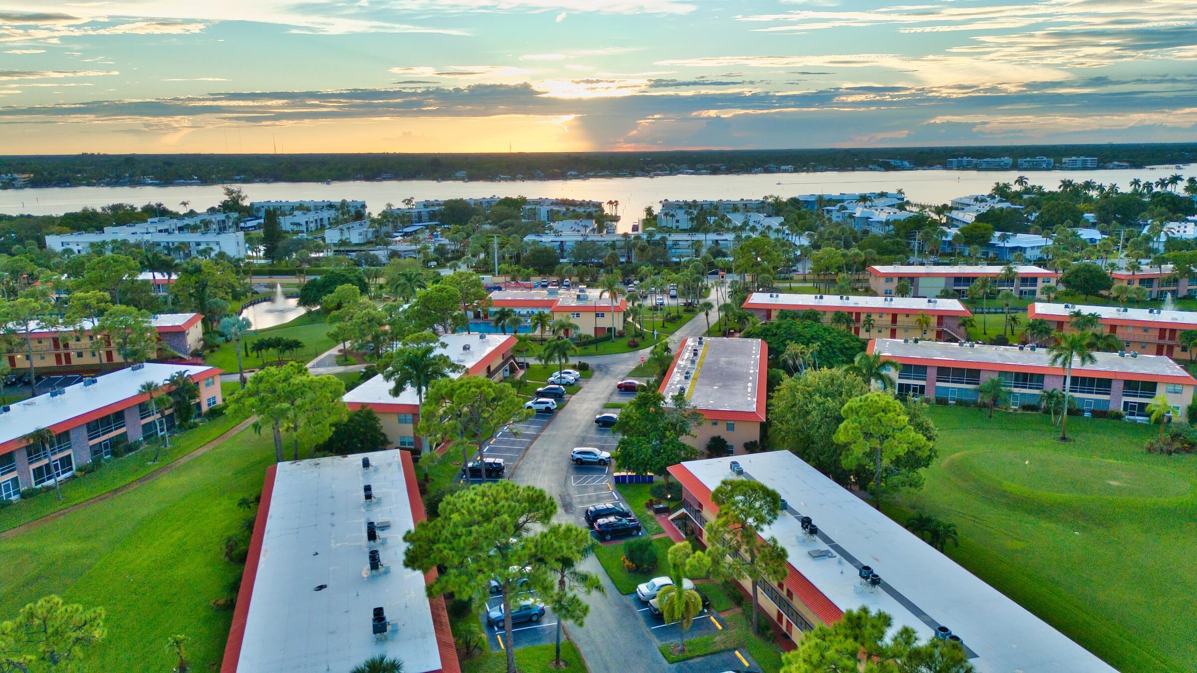 1911 Southwest Palm City Road, Unit J Stuart, FL 34994 - Photo 33 of 42 a view of a city with lawn chairs