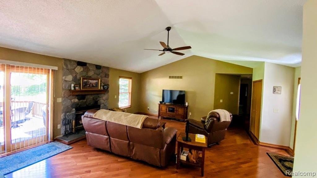8370 Rustic Trail Linden, MI 48451 - Photo 15 of 46 Gorgeous stone fireplace for cozy nights.jpg