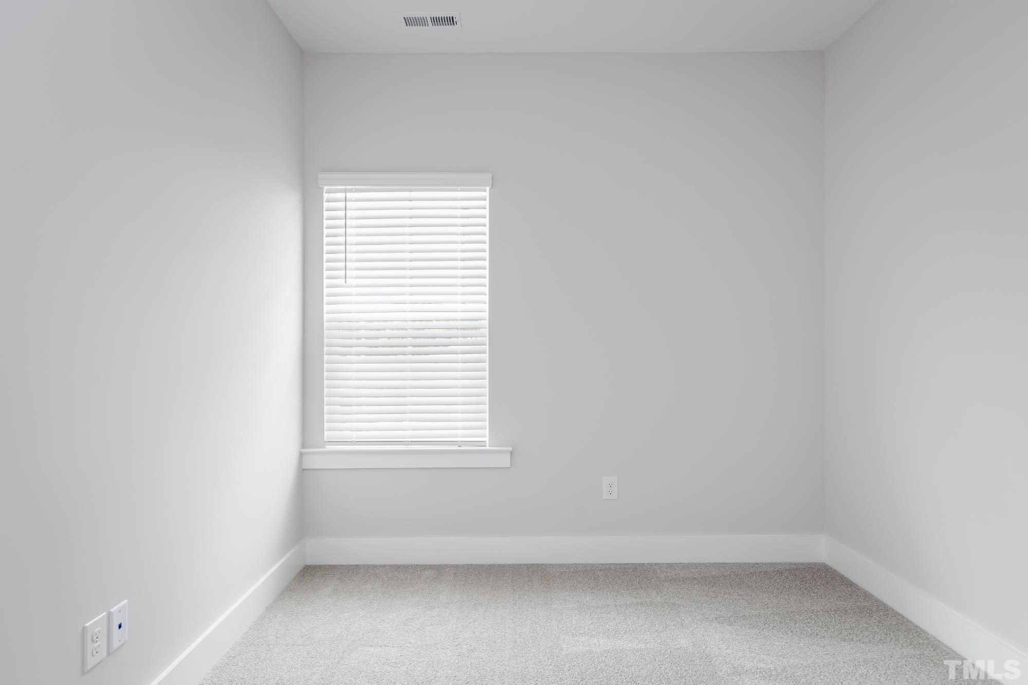 8111 Diversity Way Raleigh, NC 27613 - Photo 22 of 26 a view of room and window
