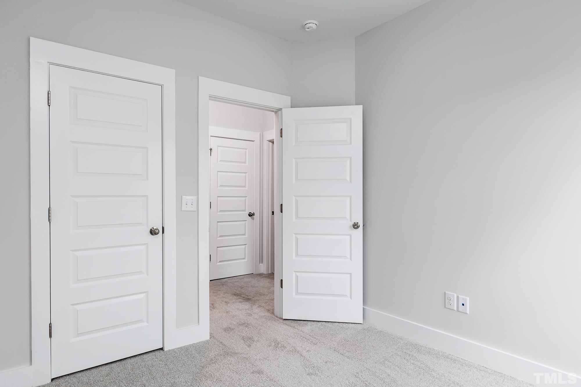 8111 Diversity Way Raleigh, NC 27613 - Photo 23 of 26 an empty room with closet area