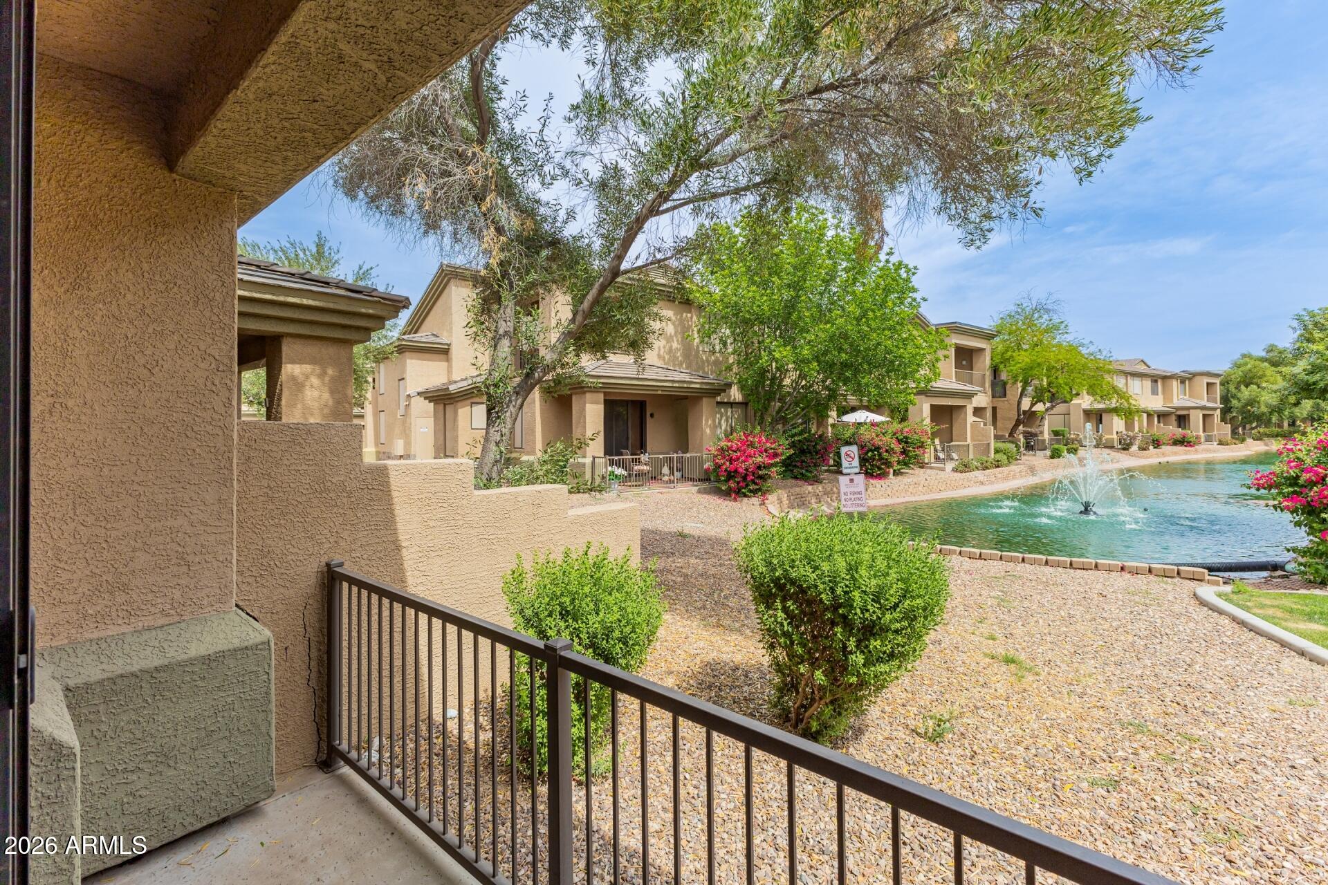 705 West Queen Creek Road, Unit 1167 Chandler, AZ 85248 - Photo 26 of 31 a view of a house with a small yard