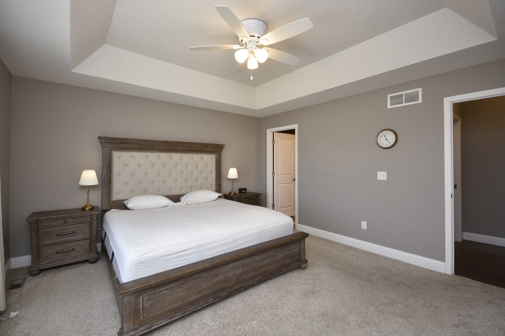 3638 Napa Lane Normal, IL 61761 - Photo 16 of 53 a bedroom with a bed and a ceiling fan