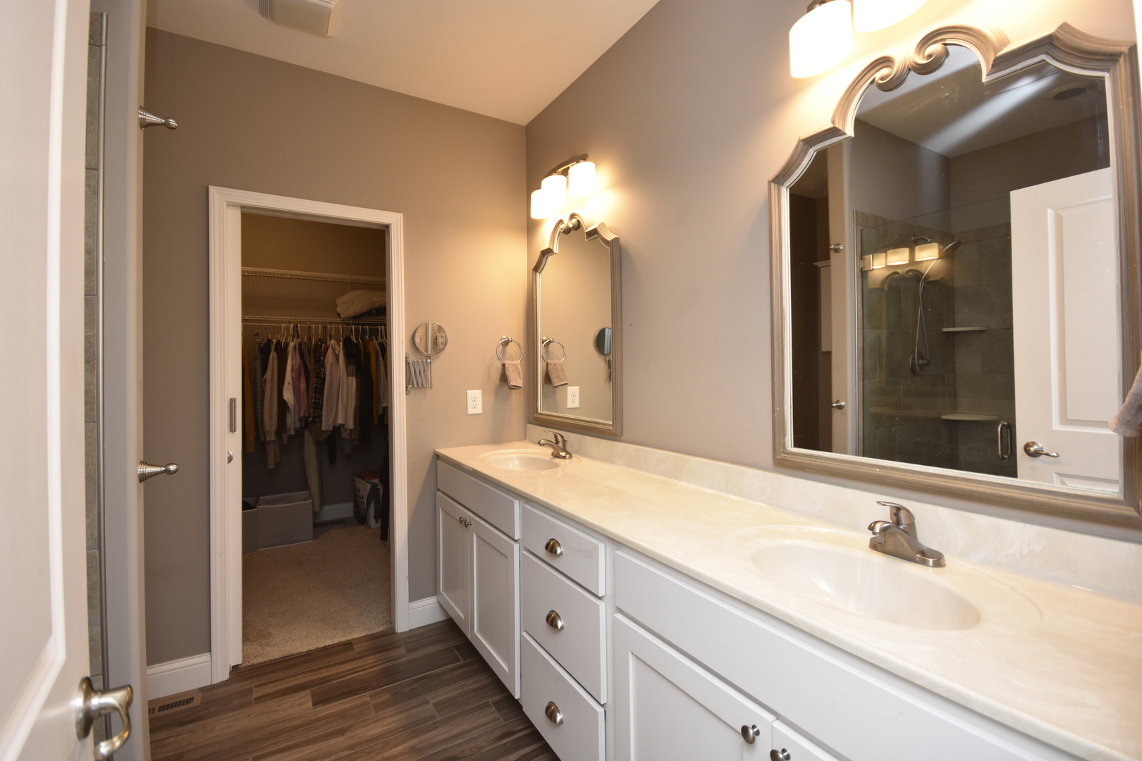 3638 Napa Lane Normal, IL 61761 - Photo 17 of 53 a bathroom with a double vanity sink and a mirror