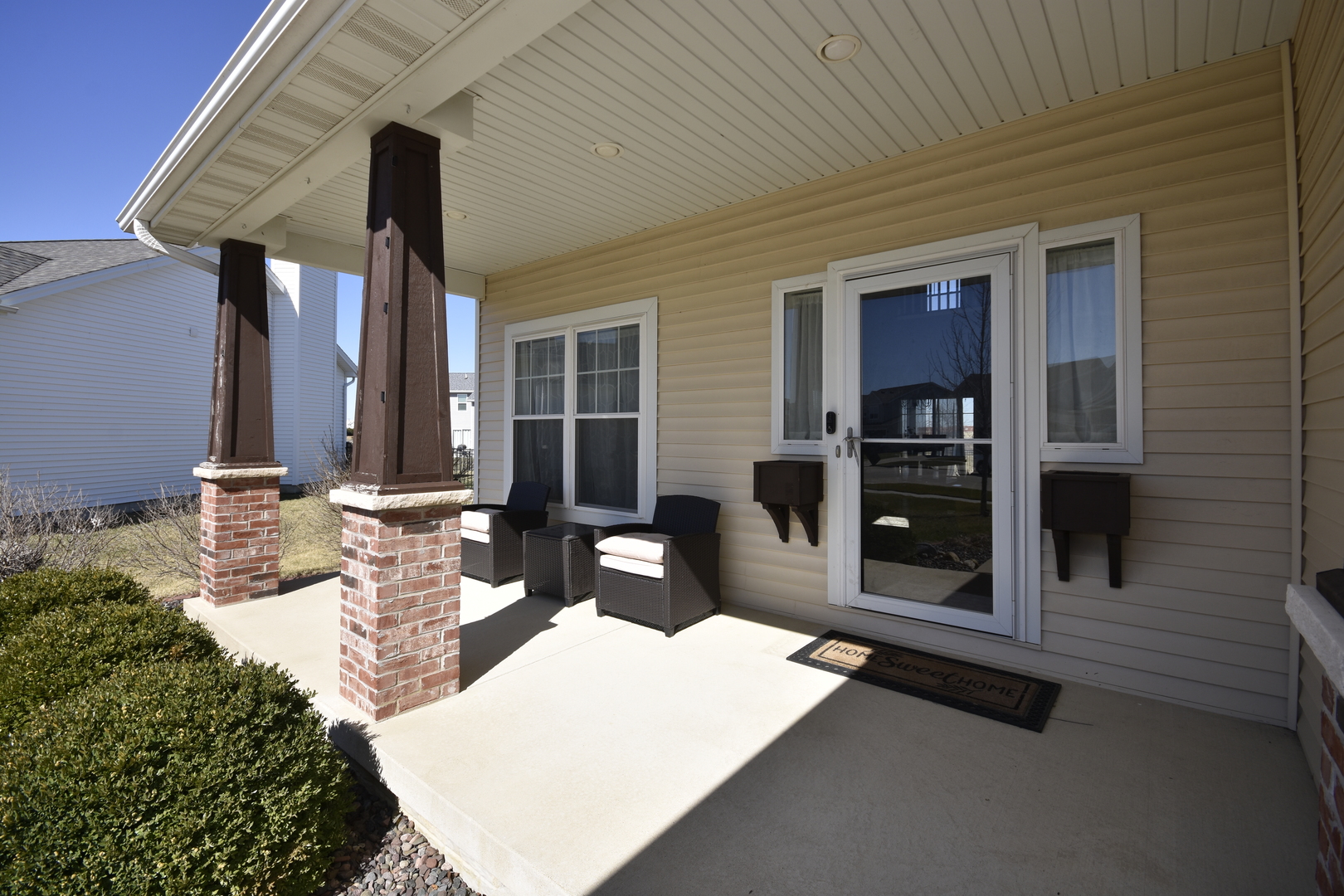 3638 Napa Lane Normal, IL 61761 - Photo 2 of 53 a building outdoor space with patio furniture and potted plants