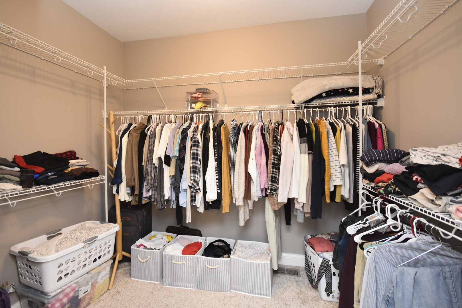 3638 Napa Lane Normal, IL 61761 - Photo 21 of 53 a view of walk in closet with clothes and shoes