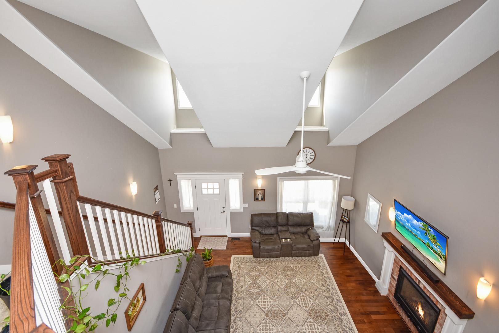 3638 Napa Lane Normal, IL 61761 - Photo 28 of 53 a living room with stairs and a wooden floor