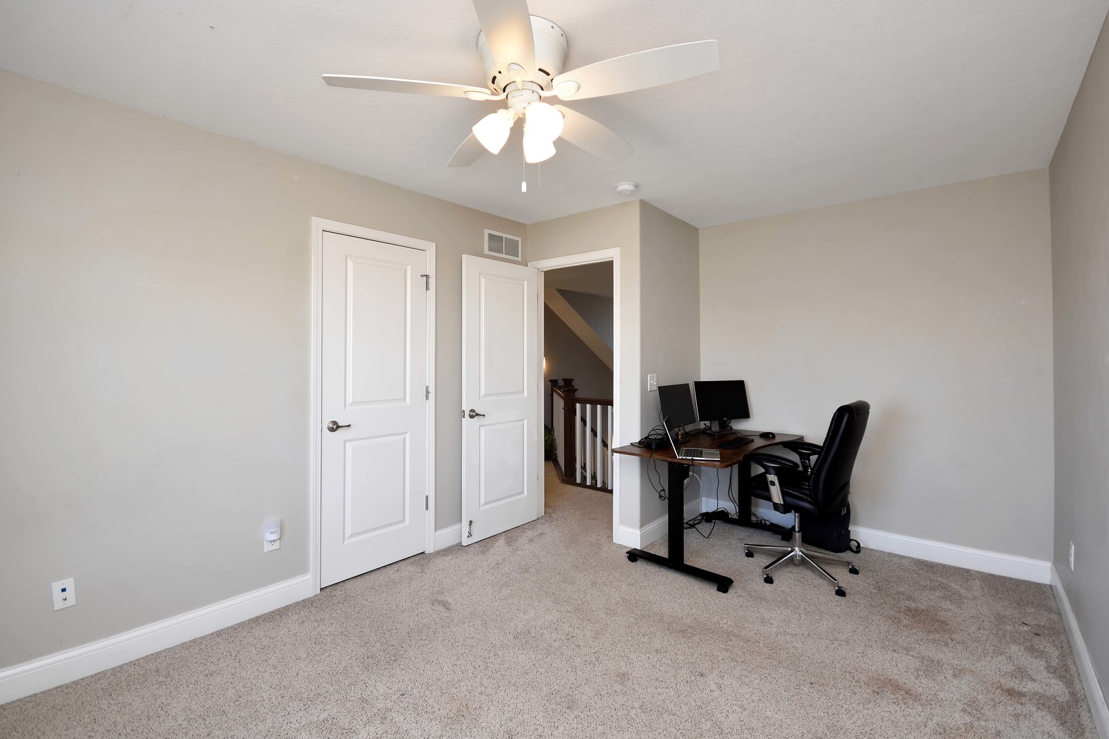 3638 Napa Lane Normal, IL 61761 - Photo 29 of 53 a work room with furniture and a ceiling fan